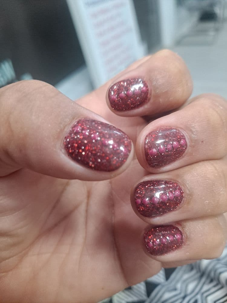 Short round nails with pink and red glitter gel polish by Nails by Ken