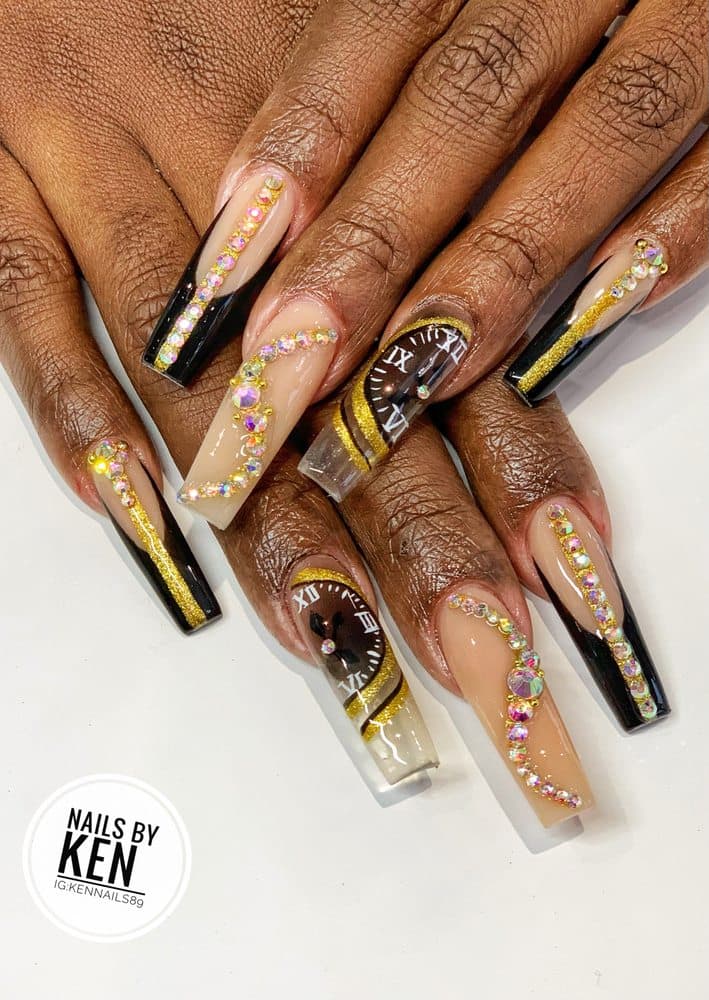 Black and gold clock nail art