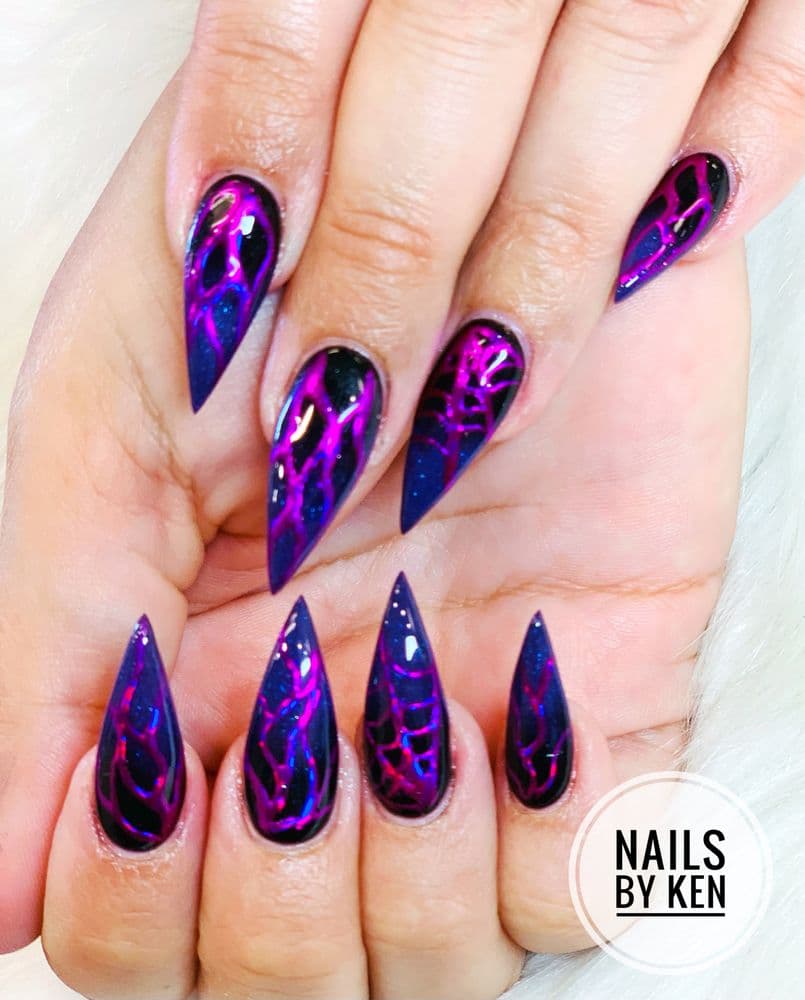 Purple lightning stiletto nails